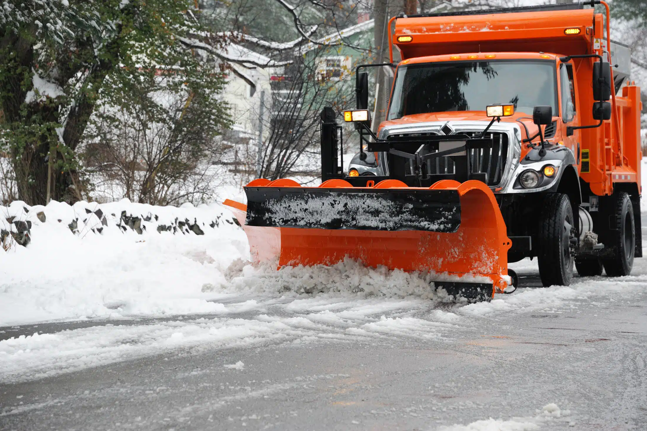 Snow plow plowing snow